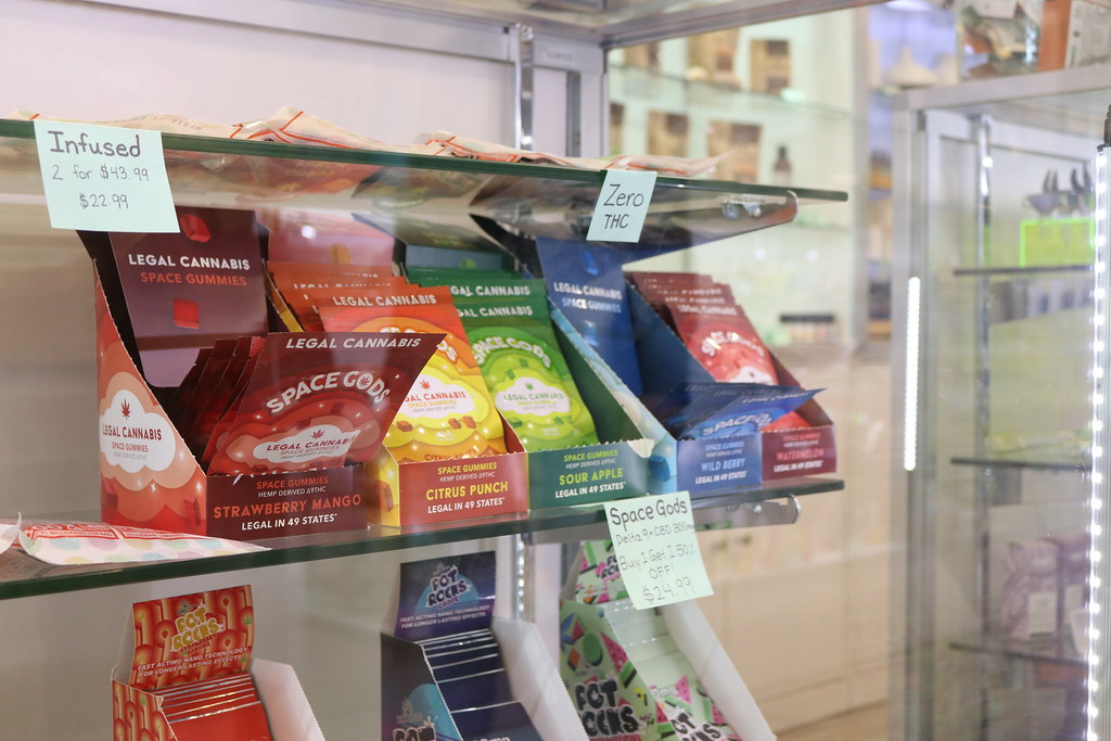 Cannabis edibles in a dispensary display case